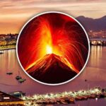 Eruzione vulcanica e Napoli sullo sfondo