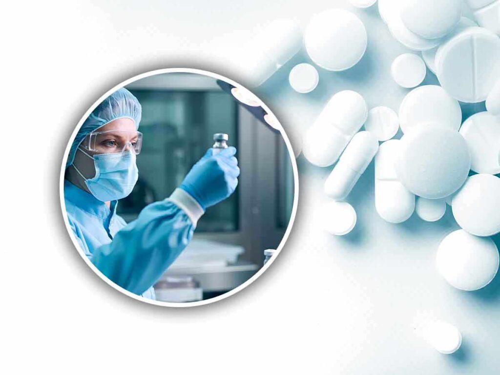 un medico e accanto tanti farmaci