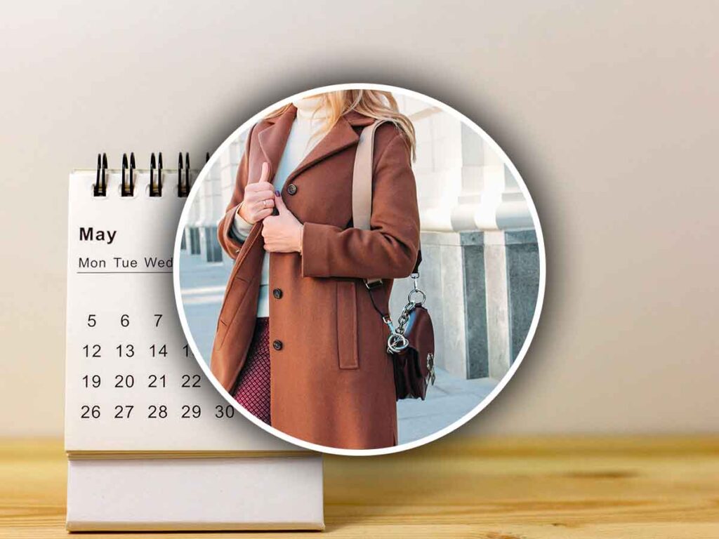 donna con il cappotto e calendario