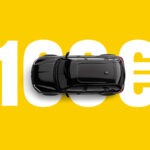 una macchina sopra la scritta 100€