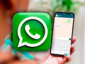logo WhatsApp con vicino uno smartphone
