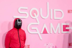 logo e personaggio di Squid Game