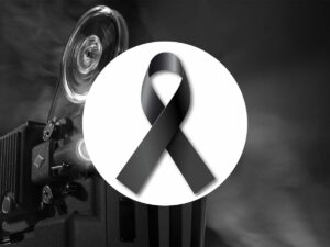 lutto simbolo e una telecamera