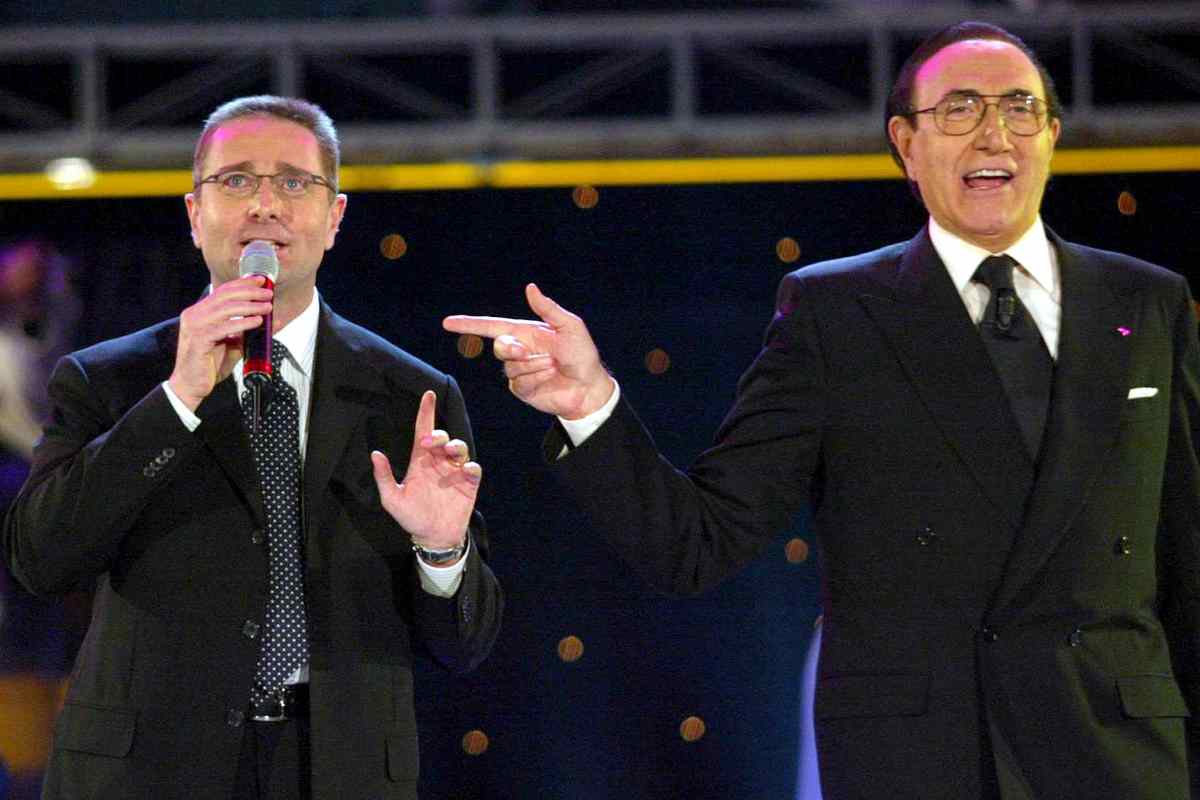 Paolo Bonolis e Pippo Baudo insieme su un palco