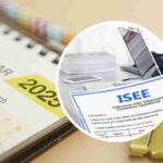 foglio con scritta ISEE e dietro un calendario