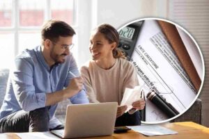 Coppia davanti a una cartella esattoriale