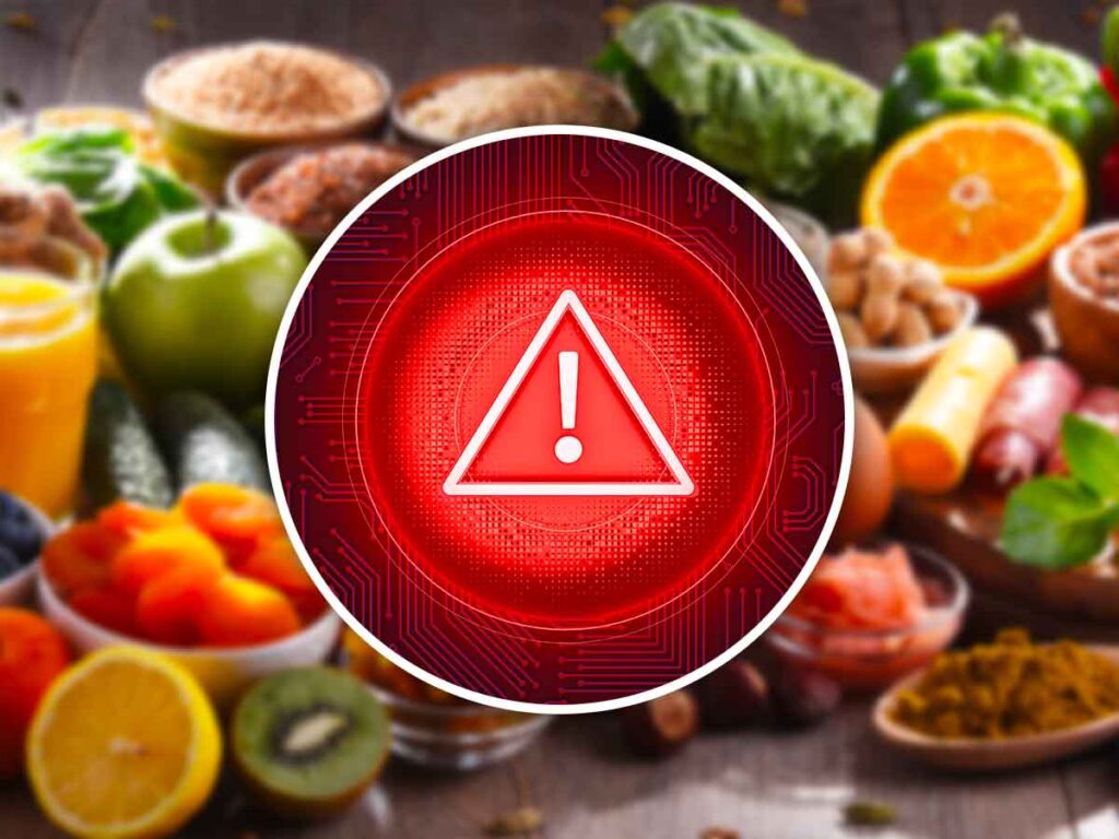 segnale di pericolo in rosso con dietro dei cibi